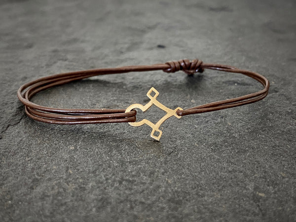 AGADEZ CROSS 14K GOLD LEATHER BRACELET