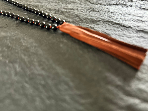 MALA BLACK ONYX COPPER TASSEL