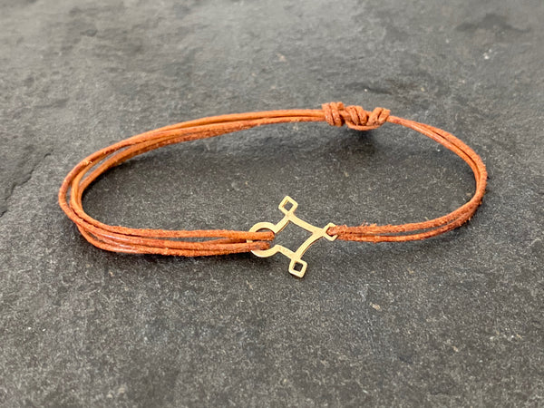 AGADEZ CROSS 14K GOLD LEATHER BRACELET