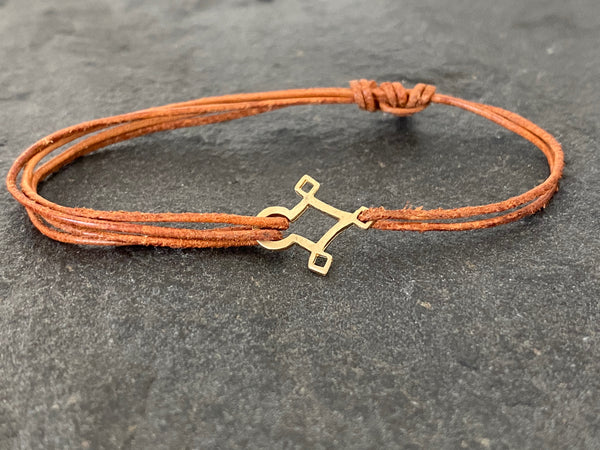 AGADEZ CROSS 14K GOLD CORD BRACELET