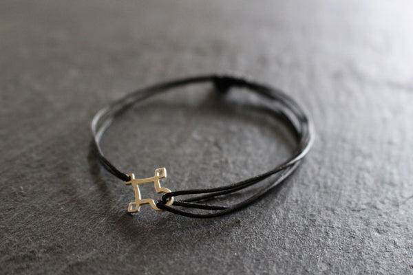 AGADEZ CROSS STERLING SILVER CORD BRACELET