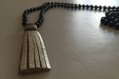 MALA BLACK ONYX GOLD TASSEL