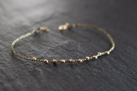 WHEEL OF FORTUNE BLACK GOLD STRING